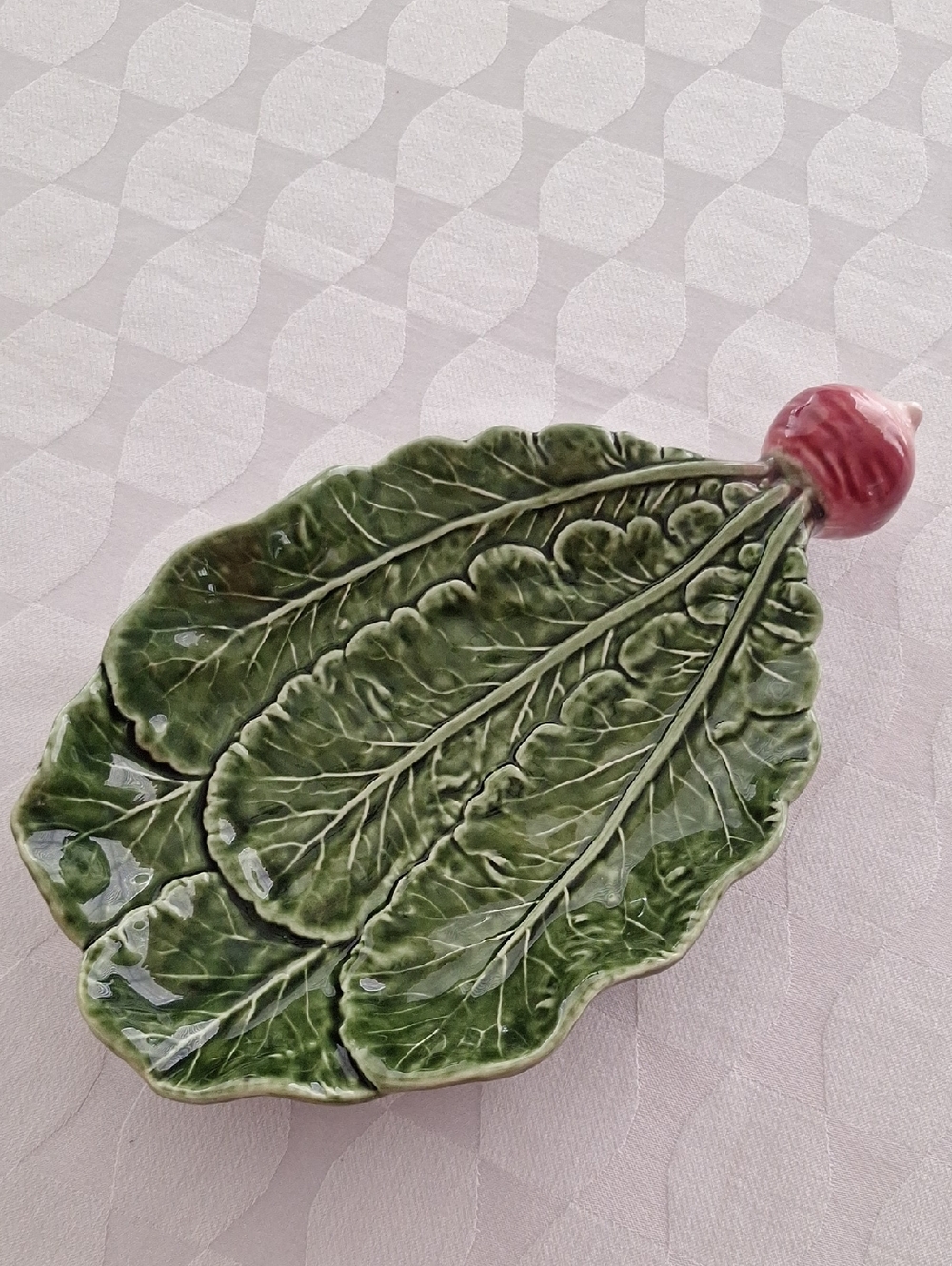 Olfaire Leaf-Shaped Ceramic Serving Dish in Green with Pink Stem.